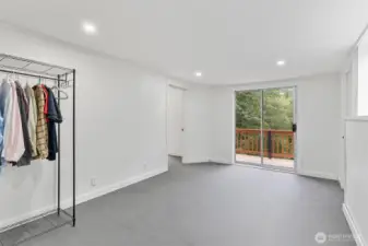 Bedroom #3 with private deck overlooking Woods creek.