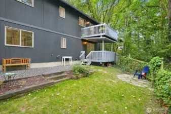 Fully fenced backyard with low maintenance landscaping.