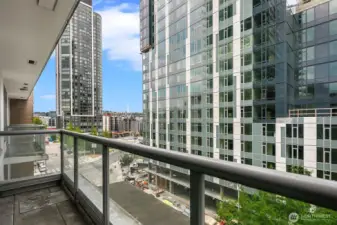 Private deck off living room with city views