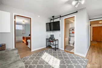 Basement bonus room with full bath, beyond the door is office or future bedroom for MIL.