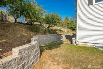 New retaining walls and leveling the landscape.