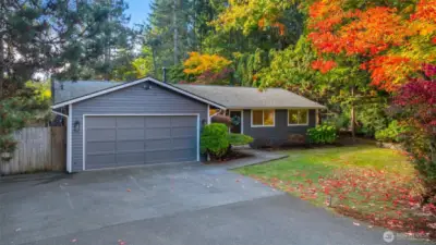 Welcome Home! A beautifully updated rambler in a 1/2 acre storybook setting.