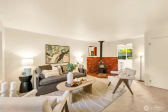 Living room with wood burning stove.