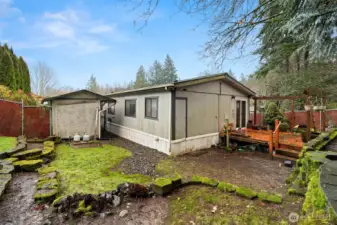View showing yard and back deck , Fully fenced Backyard