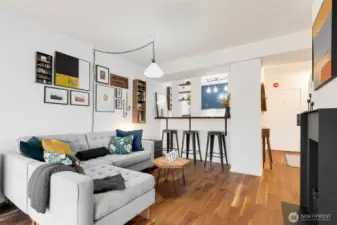 The kitchen was partially opened so you have a breakfast bar with a live edge counter.