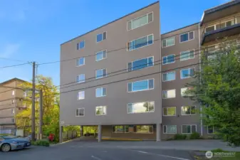 The Republican side of the building and the lobby entrance. There is guest parking spaces and a live-in property manager.