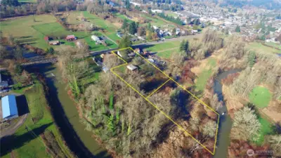 READY TO MOVE IN, still has strong potential to update and add value. Estate Sale. Includes the adjoining parcel #2197005 - in a country setting, minutes from town - a rare opportunity for buyers seeking equity or investors. Don't let this unique gem and investing opportunity slip away!