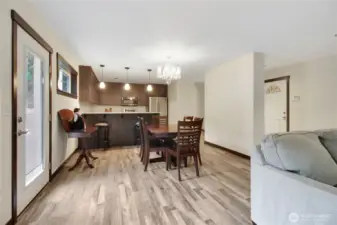 backdoor out to the patio with dining area.