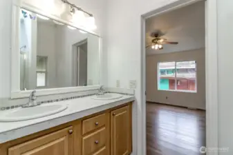 Dual vanity sinks and large mirror.