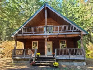 Welcome to the "log cabin in the woods". Come home to Happy Trails! This log home nestles on shy 15 acres just off Nelson Siding Road in Cle Elum. So much privacy and room to roam!