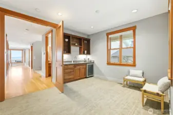 French doors open to this well appointed family room. Room for a variety of seating for whatever is happening!