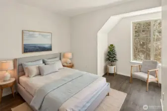 Thoughtfully sized bedroom with a warm welcoming feel with the gorgeous, picturesque greenbelt view!