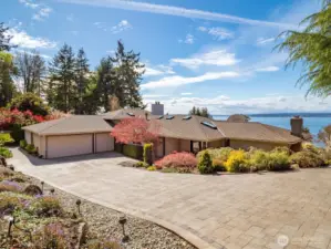 This stunning NW Contemporary home  showcases the Puget Sound and the Olympics from every floor.