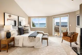 Upstairs is the primary bedroom with vaulted ceilings, 5 pcs bath & walk-in closet.