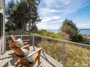 Private deck off the primary with more sweeping views of The Sound and mountains.