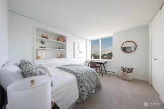 Second bedroom with built in shelving