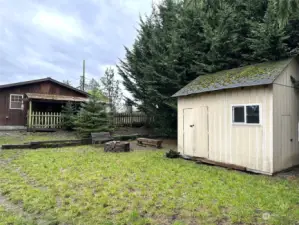 Here is looking at the back of the house, with the fenced covered patio.