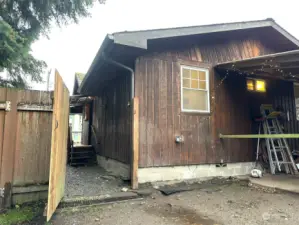 A large covered patio that can be closed off if need be.