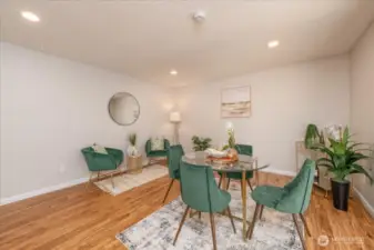You can open this wall to the living room and add French doors or add an artistic arch to connect the rooms.