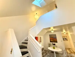 Skylights flood the living room and dining room.