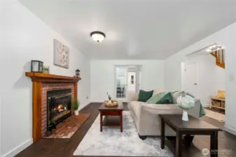 Living room with French doors to designated dining room.