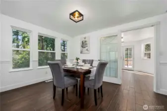 Dining room with easy access to kitchen and additional dining space.