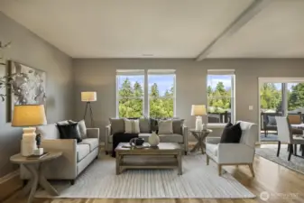 Picture-perfect living room with abundant windows, filling the space with natural light.( staged photo)