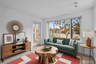 Attached balcony deck with storage closet to keep you organized is perfect for relaxing and inviting the outdoors in.