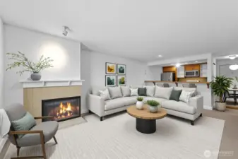 Wood burning fireplace in the living room makes a great focal point with the overhead accent light. Owner just installed new carpet and painted the entire interior.  Natural light fills the space and the open floor plan is great for entertaining or just living the life you deserve.