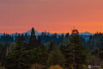 Panoramic outlook with dramatic sunset views over the Pacific Northwest landscape.