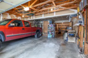 3-Car tandem garage! Back bay is currently set up for a great workshop.