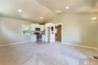 Family room with vaulted ceiling