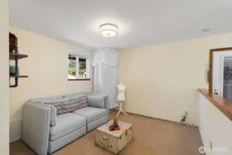 The pony wall in the Bonus Room provides a subtle separation without completely closing off the space.