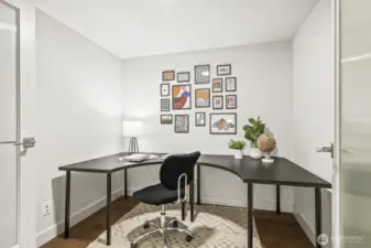The den space is perfect for work-from-home or guest area.