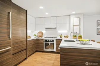 Chef’s kitchen with quartz counters, sleek European-style cabinetry, under cabinet lighting and high-end(Bosch & Thermador) stainless steel appliances-- including gas cooking!