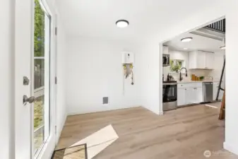 Oversized utility space offers flexibility—add a dinette, desk, or extra pantry storage.