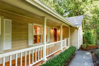 Welcoming covered porch with classic Craftsman details