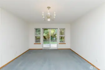 Primary bedroom with peaceful outlook and generous closet space