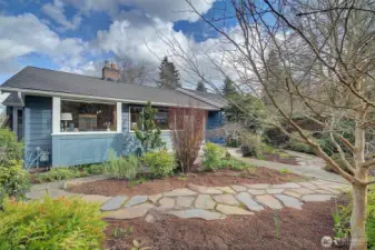 This special and magical mid-century home is nestled in its own privacy and gardens. Located in the convenient Maple Leaf neighborhood.
