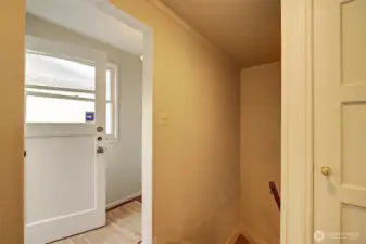 Side entrance to storage and lower level.