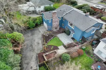 View of rear yard and entrance. Plenty of off street parking and privacy.
