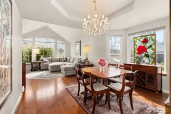 Enjoy family meals in a dedicated formal dining space, beautifully anchored by a custom Italian crystal chandelier