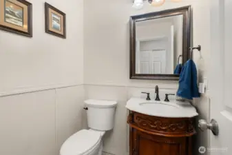 Half bath conveniently located on the main level for guests.