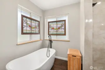 Frosted windows provide enhanced privacy while still allowing natural light to filter through.