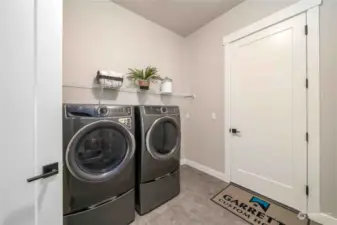 Spacious Laundry Rm with large storage closet