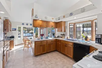 Large open kitchen. Some of the cabinets have the pull out drawers. Dura ceramic vinyl flooring that is grouted and super strong.