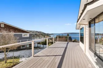 Expansive AZEK plank deck that wraps around the house.