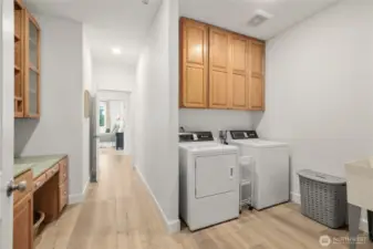 Laundry room/ mud room off the garage with plenty of built in storage.