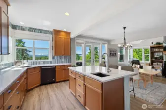 The corner sink makes doing the dishes a joy not a chore with that view.