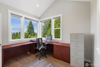 The main floor office with stunning views, and CEO would love this office.